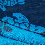 Picture of Erkek Sand Ronde des Tortues Jacquard Organik Pamuk Plaj Havlusu Mavi
